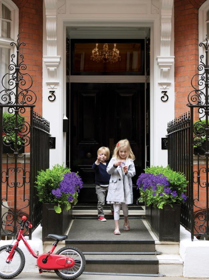 The Athenaeum Hotel & Residences London Exterior photo The entrance to the house at 33 Carlton Gardens